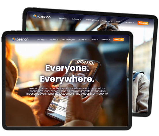 A tablet displaying the Azerion website home page, highlighting their digital advertising and entertainment media platform.